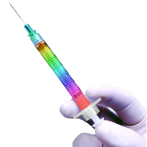 a syringe with rainbow liquid